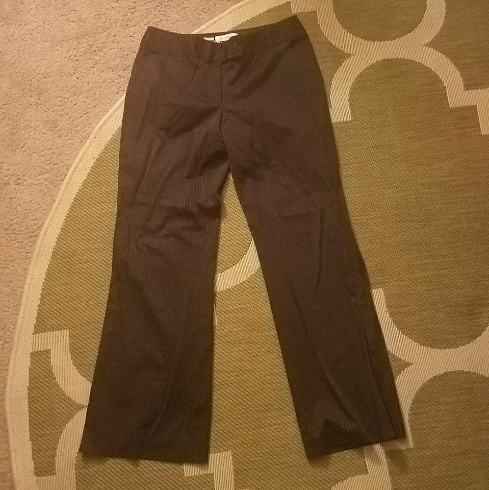 Black striped slacks with matching blazer